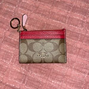 Coach card holder. Brown red pink